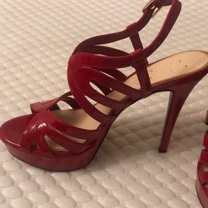 Red strappy heels. Never worn!